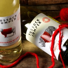 Just knitting away Tussock Jumper Wines